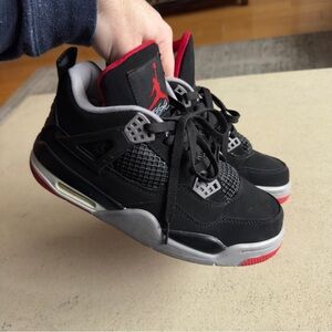 Jordan Men's Black and Gray Sneakers with Red Accents